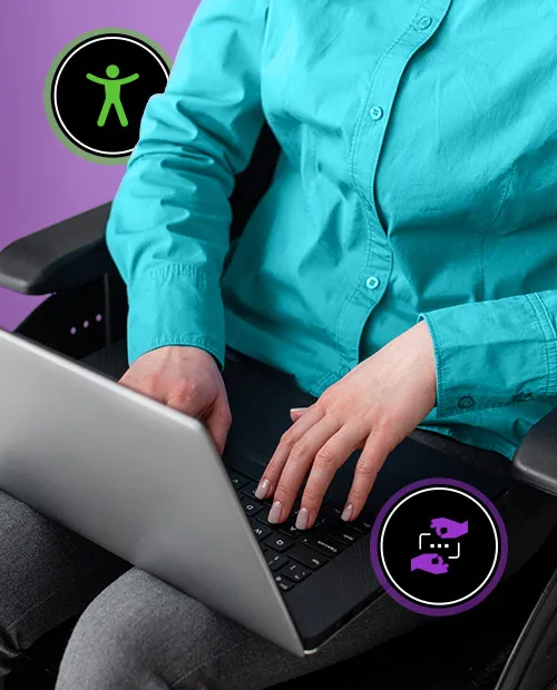 Person in wheelchair using keyboard to navigate website.