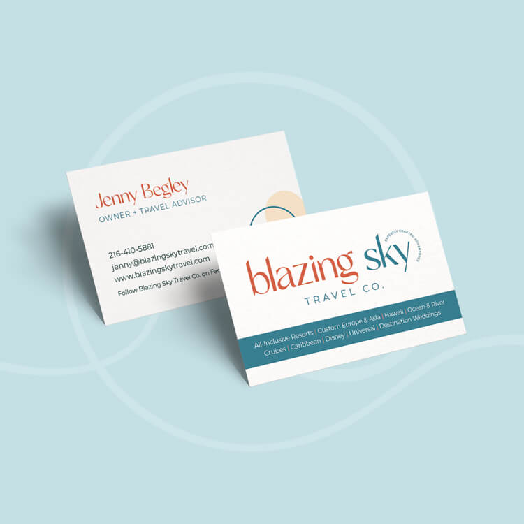 Two standing business cards, front and back sides with the logo on the front and contact details on the back.