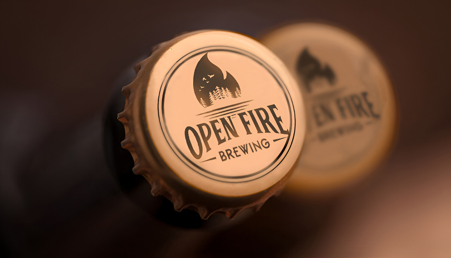 Inverse design of logo on top of a beer bottle cap, to show logo still looks good when resized smaller.