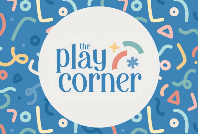 The Play Corner logo in blue and pastel colors, surrounded by a white circle and colorful abstract shapes on a blue background.